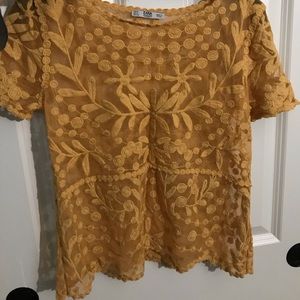 Orange, see-through top